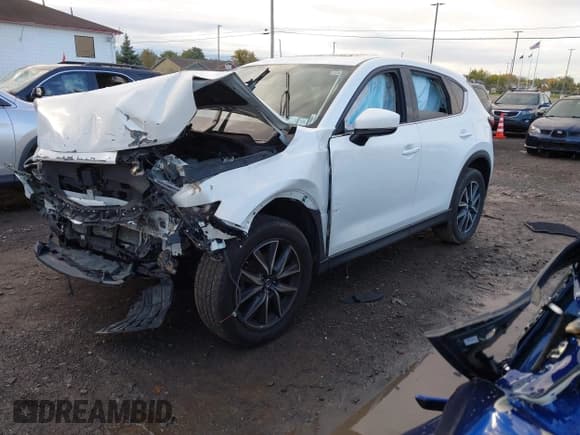 ✅ 2018 Mazda CX-5 Grand Touring • VIN: JM3KFBDM2J0441881 • Lot: 43526832. Listed on IAAI with 104,567 mi. Free auction sales archive from the USA and detailed vehicle history report at DreamBid. Image 17.