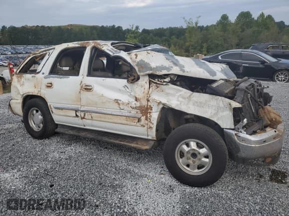 ✅ 2003 GMC Yukon • VIN: 1GKEC13723J158629 • Lot: 72040044. Listed on Copart with Not provided. Free auction sales archive from the USA and detailed vehicle history report at DreamBid. Image 4.