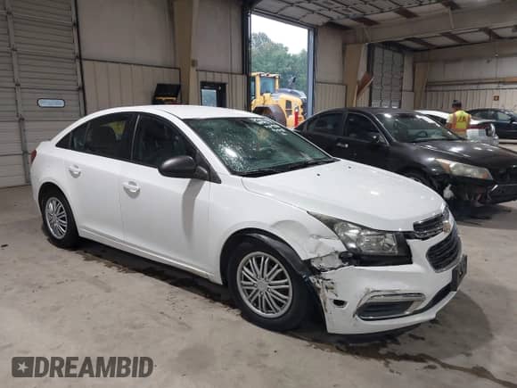 2015 Chevrolet Cruze LS z VIN 1G1PA5SH4F7209231, wystawiony jako IAAI lot #43335340 z przebiegiem 137 165 mil mil oraz . Historia ofert i sprzedaży dostępna na DreamBid. Obrazek 1.