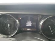 ✅ 2023 Jeep Wrangler • VIN: 1C4JJXN66PW662910 • Лот: 68686055. Опубликован ранее на Copart с пробегом 28 032 миль. Бесплатный доступ к архиву аукционных продаж из США и подробный отчёт об истории автомобиля на DreamBid. Изображение 9.