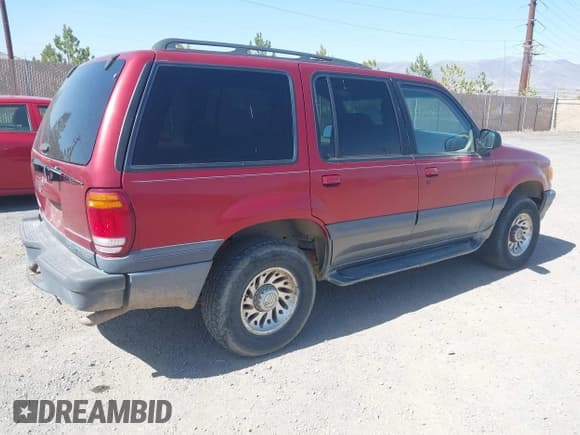 ✅ 1999 Mercury Mountaineer • VIN: 4M2ZU54E8XUJ33603 • Lot: 42010958. Listed on IAAI with 252,141 mi. Free auction sales archive from the USA and detailed vehicle history report at DreamBid. Image 4.