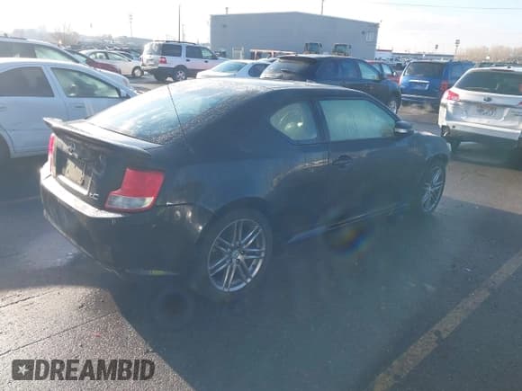 ✅ 2013 Scion tC • VIN: JTKJF5C77D3048245 • Lot: 43850828. Wystawiony na IAAI z przebiegiem 207 024 mil. Bezpłatny archiwum sprzedaży aukcyjnych z USA i szczegółowy raport historii pojazdu na DreamBid. Zdjęcie 4.