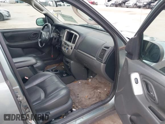 ✅ 2004 Mazda Tribute ES • VIN: 4F2CZ96174KM04432 • Lot: 42634460. Wystawiony na IAAI z przebiegiem 141 688 mil. Bezpłatny archiwum sprzedaży aukcyjnych z USA i szczegółowy raport historii pojazdu na DreamBid. Zdjęcie 5.