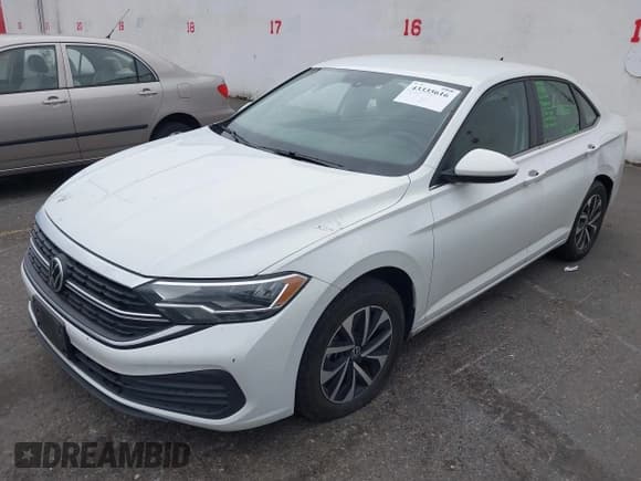 ✅ 2023 Volkswagen Jetta S • VIN: 3VW4M7BU2PM026795 • Lot: 43335616. Wystawiony na IAAI z przebiegiem 27 812 mil. Bezpłatny archiwum sprzedaży aukcyjnych z USA i szczegółowy raport historii pojazdu na DreamBid. Zdjęcie 17.