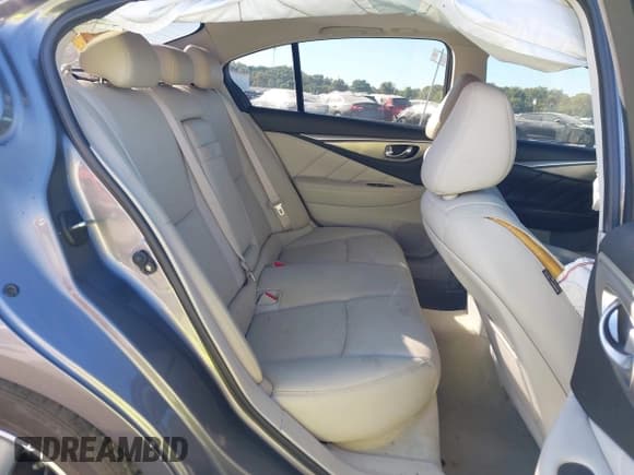 ✅ 2014 Infiniti Q50 Premium • VIN: JN1BV7AR0EM702841 • Lot: 43380882. Listed on IAAI with 100,815 mi. Free auction sales archive from the USA and detailed vehicle history report at DreamBid. Image 8.