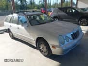 ✅ 2001 Mercedes-Benz E 320 • VIN: WDBJH65J51B340718 • Lot: 42666609. Listed on IAAI with 166,444 mi. Free auction sales archive from the USA and detailed vehicle history report at DreamBid. Image 1.