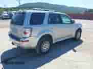 2010 Mercury Mariner Premier z VIN 4M2CN9HGXAKJ16116, wystawiony jako IAAI lot #43140056 z przebiegiem 194 370 mil mil oraz . Historia ofert i sprzedaży dostępna na DreamBid. Obrazek 4.