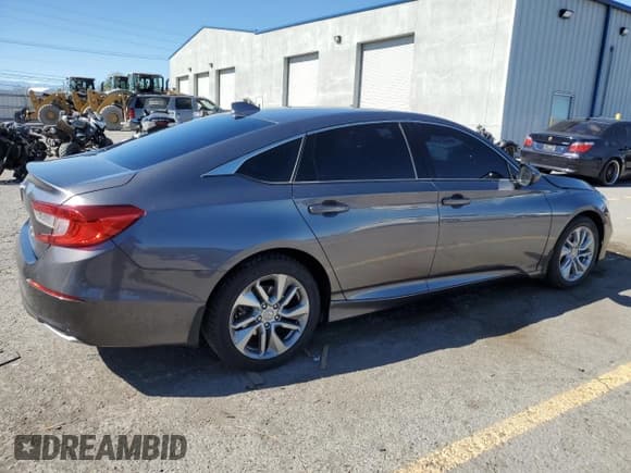 ✅ 2019 Honda Accord LX • VIN: 1HGCV1F19KA126926 • Лот: 87279595. Опубликован ранее на Copart с пробегом 59 271 миль. Бесплатный доступ к архиву аукционных продаж из США и подробный отчёт об истории автомобиля на DreamBid. Изображение 3.