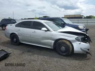 2013 Chevrolet Impala Police with VIN 2G1WD5E34D1208237, listed as a Copart auction lot 65243995 with 97,040 mi miles and Salvage title. Bid and sale history available at DreamBid. Image 4.