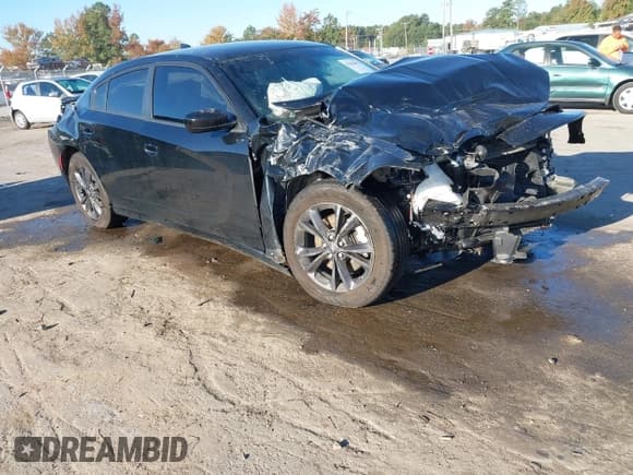 ✅ 2023 Dodge Charger SXT • VIN: 2C3CDXJGXPH569471 • Lot: 43469092. Listed on IAAI with 41,338 mi. Free auction sales archive from the USA and detailed vehicle history report at DreamBid. Image 1.