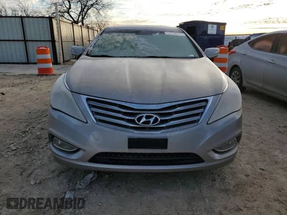 2013 Hyundai Azera с VIN KMHFH4JG0DA205691, выставлен на аукционе Copart как лот 87896515 с пробегом 203 115 миль миль и Чистый • Clean title. История ставок и продаж доступна на DreamBid. Изображение 5.