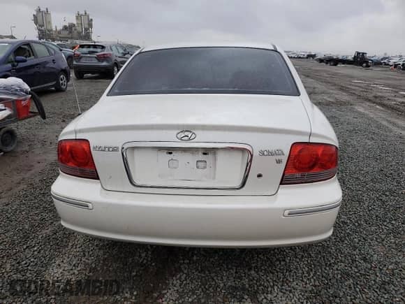 2004 Hyundai Sonata GLS с VIN KMHWF35H54A978952, выставлен на аукционе Copart как лот 49312725 с пробегом Не указан миль и Списание • Salvage title. История ставок и продаж доступна на DreamBid. Изображение 6.