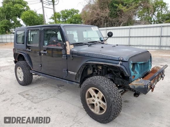 ✅ 2008 Jeep Wrangler Unlimited Rubicon • VIN: 1J4GA69128L529271 • Lot: 58939945. Listed on Copart with 94,503 mi. Free auction sales archive from the USA and detailed vehicle history report at DreamBid. Image 4.