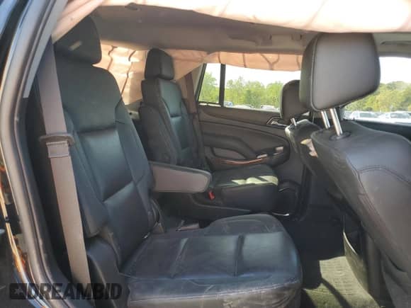 2020 Chevrolet Tahoe Premier z VIN 1GNSKCKJ4LR294570, wystawiony jako Copart lot #53362385 z przebiegiem 95 015 mil mil oraz Szkoda całkowita • Salvage title. Historia ofert i sprzedaży dostępna na DreamBid. Obrazek 11.