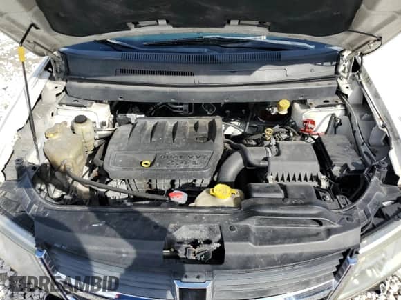 2009 Dodge Journey SE z VIN 3D4GG47B99T549983, wystawiony jako Copart lot #87016725 z przebiegiem 176 898 mil mil oraz Szkoda całkowita • Salvage title. Historia ofert i sprzedaży dostępna na DreamBid. Obrazek 11.