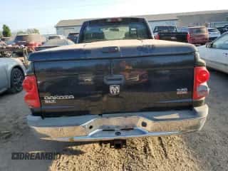2005 Dodge Dakota SLT с VIN 1D7HW42N75S269518, выставлен на аукционе Copart как лот 71501904 с пробегом 105 673 миль миль и Чистый • Clean title. История ставок и продаж доступна на DreamBid. Изображение 6.
