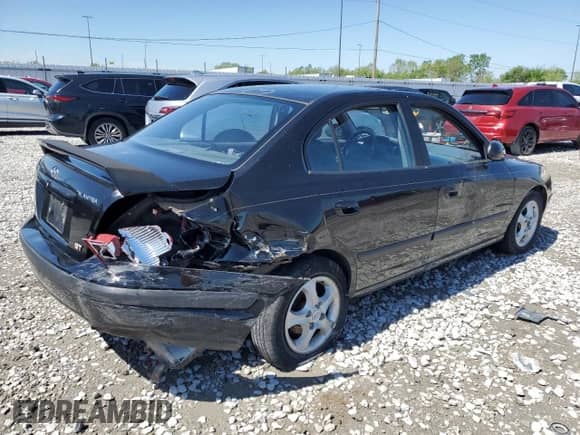 2003 Hyundai Elantra GLS z VIN KMHDN45D43U699230, wystawiony jako Copart lot #68822534 z przebiegiem 160 821 mil mil oraz Nie do naprawy • Non repairable. Historia ofert i sprzedaży dostępna na DreamBid. Obrazek 3.