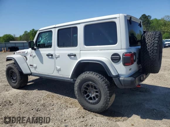 ✅ 2022 Jeep Wrangler Unlimited Rubicon • VIN: 1C4JJXFG0NW127415 • Lot: 52253935. Listed on Copart with 36,988 mi. Free auction sales archive from the USA and detailed vehicle history report at DreamBid. Image 2.