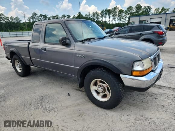 ✅ 1999 Ford Ranger XLT • VIN: 1FTZR15X1XTA02809 • Lot: 63849535. Listed on Copart with 163,939 mi. Free auction sales archive from the USA and detailed vehicle history report at DreamBid. Image 4.