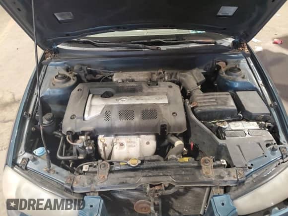 2003 Hyundai Elantra GLS z VIN KMHDN45D83U495806, wystawiony jako Copart lot #65962504 z przebiegiem 131 056 mil mil oraz Szkoda całkowita • Salvage title. Historia ofert i sprzedaży dostępna na DreamBid. Obrazek 11.