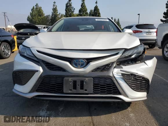 2021 Toyota Camry Hybrid XSE с VIN 4T1K31AKXMU548944, выставлен на аукционе Copart как лот 68894265 с пробегом 81 648 миль миль и Списание • Salvage title. История ставок и продаж доступна на DreamBid. Изображение 5.