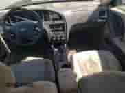 2005 Hyundai Elantra GLS z VIN KMHDN46D35U149616, wystawiony jako Copart lot #81009975 z przebiegiem 233 904 mil mil oraz Szkoda całkowita • Salvage title. Historia ofert i sprzedaży dostępna na DreamBid. Obrazek 8.