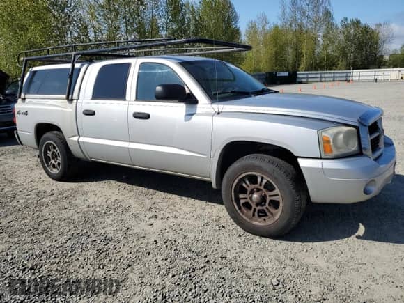 2007 Dodge Dakota SLT с VIN 1D7HW48K67S137401, выставлен на аукционе Copart как лот 53664505 с пробегом 182 862 миль миль и Чистый • Clean title. История ставок и продаж доступна на DreamBid. Изображение 4.