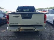 ✅ 2015 Nissan Frontier S • VIN: 1N6AD0EV0FN717018 • Lot: 42322428. Listed on IAAI with 104,715 mi. Free auction sales archive from the USA and detailed vehicle history report at DreamBid. Image 16.