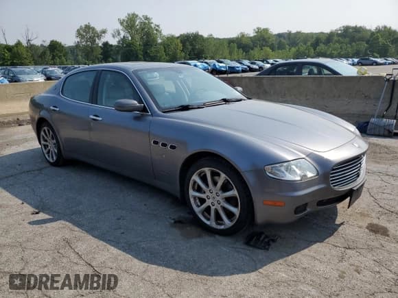 ✅ 2005 Maserati Quattroporte • VIN: ZAMCE39A650019005 • Lot: 66991265. Listed on Copart with 70,573 mi. Free auction sales archive from the USA and detailed vehicle history report at DreamBid. Image 4.