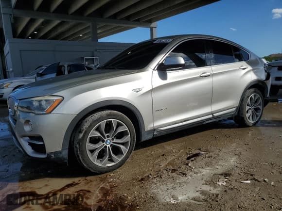 ✅ 2015 BMW X4 xDrive28i • VIN: 5UXXW3C50F0M88914 • Lot: 89833905. Listed on Copart with 87,775 mi. Free auction sales archive from the USA and detailed vehicle history report at DreamBid. Image 1.