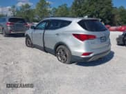 ✅ 2017 Hyundai Santa Fe 2.4L • VIN: 5XYZU3LB4HG399480 • Lot: 43458871. Listed on IAAI with 118,792 mi. Free auction sales archive from the USA and detailed vehicle history report at DreamBid. Image 3.