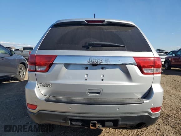 ✅ 2011 Jeep Grand Cherokee Laredo • VIN: 1J4RR4GG1BC572715 • Lot: 90520495. Listed on Copart with 136,553 mi. Free auction sales archive from the USA and detailed vehicle history report at DreamBid. Image 6.