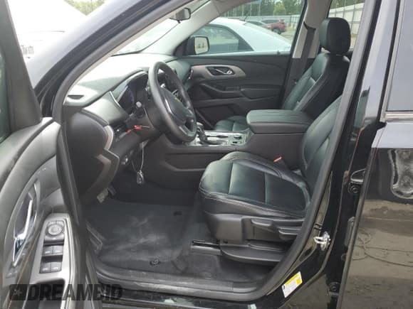 ✅ 2021 Chevrolet Traverse LS • VIN: 1GNEVFKW4MJ199623 • Lot: 58165924. Wystawiony na Copart z przebiegiem 49 999 mil. Bezpłatny archiwum sprzedaży aukcyjnych z USA i szczegółowy raport historii pojazdu na DreamBid. Zdjęcie 7.