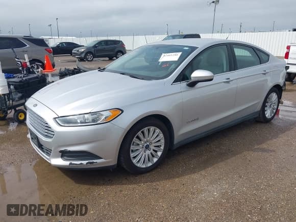 ✅ 2015 Ford Fusion S Hybrid • VIN: 3FA6P0UU8FR132666 • Lot: 42401286. Listed on IAAI with 71,418 mi. Free auction sales archive from the USA and detailed vehicle history report at DreamBid. Image 2.