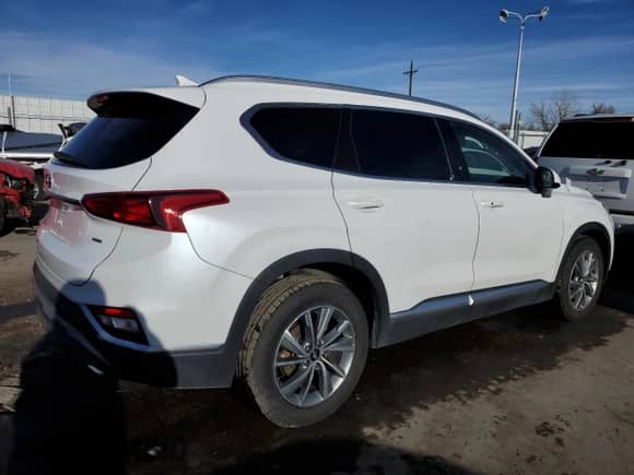 2019 Hyundai Santa Fe SEL z VIN 5NMS3CAD8KH057052, wystawiony jako Copart lot #39384233 z przebiegiem 49 927 mil mil oraz . Historia ofert i sprzedaży dostępna na DreamBid. Obrazek 3.