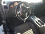 ✅ 2012 Dodge Challenger SXT • VIN: 2C3CDYAGXCH259594 • Lot: 77421654. Wystawiony na Copart z przebiegiem 126 271 mil. Bezpłatny archiwum sprzedaży aukcyjnych z USA i szczegółowy raport historii pojazdu na DreamBid. Zdjęcie 8.