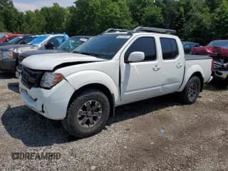 ✅ 2015 Nissan Frontier Pro-4X • VIN: 1N6AD0EV5FN715233 • Lot: 62808565. Listed on Copart with 107,548 mi. Free auction sales archive from the USA and detailed vehicle history report at DreamBid. Image 1.