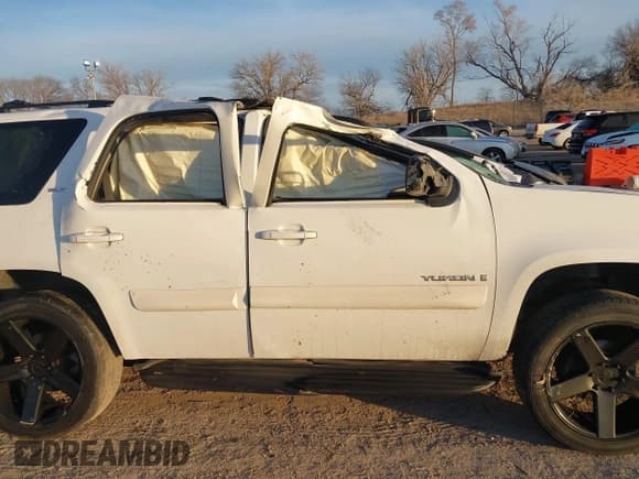 ✅ 2009 GMC Yukon SLT 4SB • VIN: 1GKFK33069R223478 • Lot: 41466388. Listed on IAAI with 241,959 mi. Free auction sales archive from the USA and detailed vehicle history report at DreamBid. Image 13.