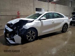 ✅ 2021 Kia Forte LXS • VIN: 3KPF24ADXME390048 • Лот: 96728895. Опубликован ранее на Copart с пробегом 48 703 миль. Бесплатный доступ к архиву аукционных продаж из США и подробный отчёт об истории автомобиля на DreamBid. Изображение 1.