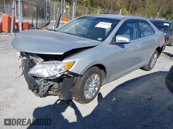 2012 Toyota Camry LE with VIN 4T1BF1FK7CU006571, listed as a IAAI auction lot 43580709 with 256,798 mi miles and . Bid and sale history available at DreamBid. Image 2.
