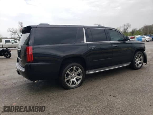 2015 Chevrolet Suburban LTZ с VIN 1GNSCKKC3FR291995, выставлен на аукционе Copart как лот 51656815 с пробегом 156 504 миль миль и Чистый • Clean title. История ставок и продаж доступна на DreamBid. Изображение 3.
