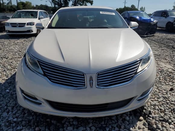 ✅ 2016 Lincoln MKZ • VIN: 3LN6L2G91GR616975 • Lot: 69945335. Wystawiony na Copart z przebiegiem 167 624 mil. Bezpłatny archiwum sprzedaży aukcyjnych z USA i szczegółowy raport historii pojazdu na DreamBid. Zdjęcie 5.