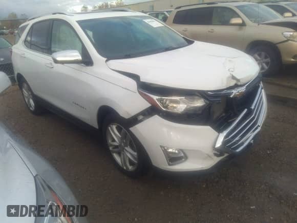 2020 Chevrolet Equinox Premier z VIN 3GNAXYEX3LS534571, wystawiony jako IAAI lot #43458472 z przebiegiem 116 711 mil mil oraz . Historia ofert i sprzedaży dostępna na DreamBid. Obrazek 1.