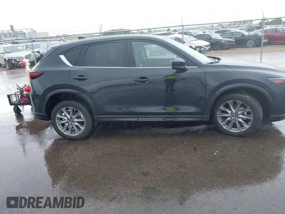 ✅ 2024 Mazda CX-5 S Premium • VIN: JM3KFBDL3R0444145 • Лот: 42297028. Опубликован ранее на IAAI с пробегом 22 665 миль. Бесплатный доступ к архиву аукционных продаж из США и подробный отчёт об истории автомобиля на DreamBid. Изображение 13.