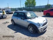✅ 2003 MINI Hardtop S • VIN: WMWRE33443TD70055 • Lot: 42132875. Listed on IAAI with 154,901 mi. Free auction sales archive from the USA and detailed vehicle history report at DreamBid. Image 1.