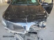 ✅ 2014 Lincoln MKS • VIN: 1LNHL9EK6EG611346 • Лот: 89897425. Опубликован ранее на Copart с пробегом 94 286 миль. Бесплатный доступ к архиву аукционных продаж из США и подробный отчёт об истории автомобиля на DreamBid. Изображение 11.