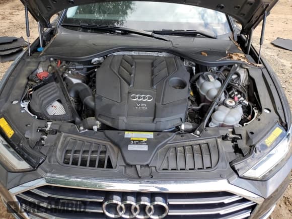 ✅ 2020 Audi A8 • VIN: WAU8HAF89LN014630 • Лот: 70131205. Опубликован ранее на Copart с пробегом 65 988 миль. Бесплатный доступ к архиву аукционных продаж из США и подробный отчёт об истории автомобиля на DreamBid. Изображение 11.