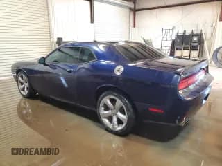 ✅ 2013 Dodge Challenger SXT • VIN: 2C3CDYAG9DH679607 • Lot: 68086724. Wystawiony na Copart z przebiegiem 144 514 mil. Bezpłatny archiwum sprzedaży aukcyjnych z USA i szczegółowy raport historii pojazdu na DreamBid. Zdjęcie 2.