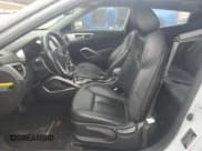 ✅ 2014 Hyundai Veloster • VIN: KMHTC6AD6EU213698 • Lot: 78961304. Wystawiony na Copart z przebiegiem 150 864 mil. Bezpłatny archiwum sprzedaży aukcyjnych z USA i szczegółowy raport historii pojazdu na DreamBid. Zdjęcie 7.