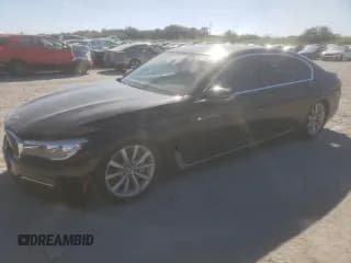 ✅ 2018 BMW 7 Series 740i • VIN: WBA7E2C5XJG741510 • Лот: 85426975. Опубликован ранее на Copart с пробегом 63 445 миль. Бесплатный доступ к архиву аукционных продаж из США и подробный отчёт об истории автомобиля на DreamBid. Изображение 1.